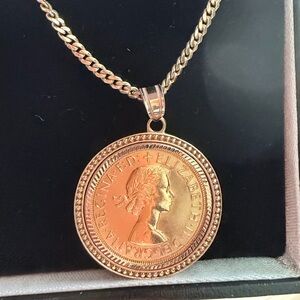 22K gold coin, with 14K Chain .
Beautiful Necklaces.